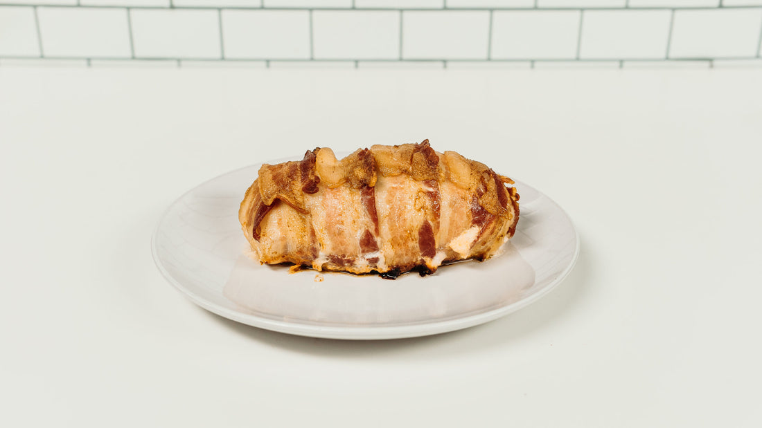 Jalapeno and Cream Cheese Chicken Roll on a white plate