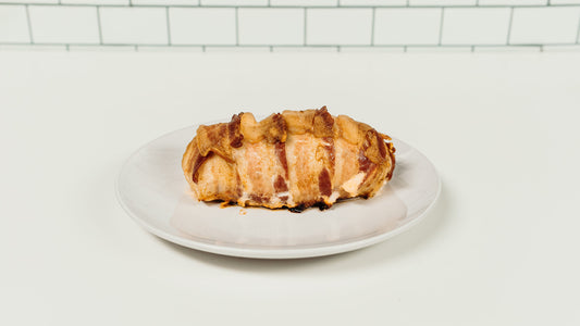 Jalapeno and Cream Cheese Chicken Roll on a white plate